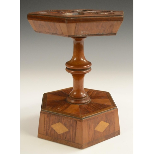 2036 - Treen - a 19th century partridge wood, satinwood and mahogany hexagonal six-section pipe stand, turn... 