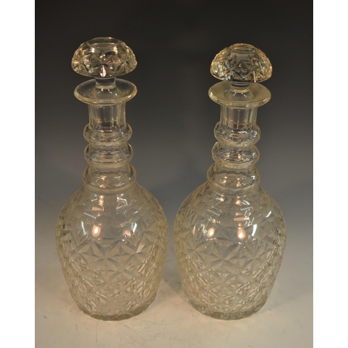 204 - A goliath pair of post-Regency glass Prussian-shaped decanters and stoppers, hobnail cut, each neck ... 