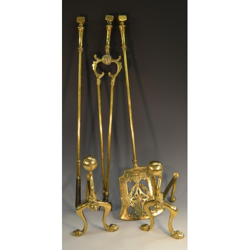 2058 - An early 19th century brass fireside companion set