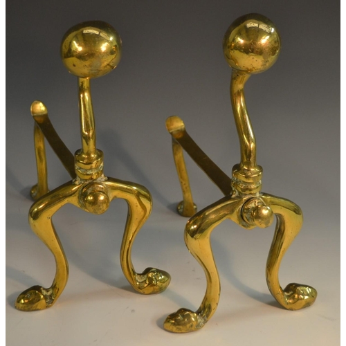 2058 - An early 19th century brass fireside companion set