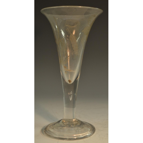 206 - A large George III ale glass, the trumpet-shaped bowl etched and engraved with hops, domed foot, sli... 