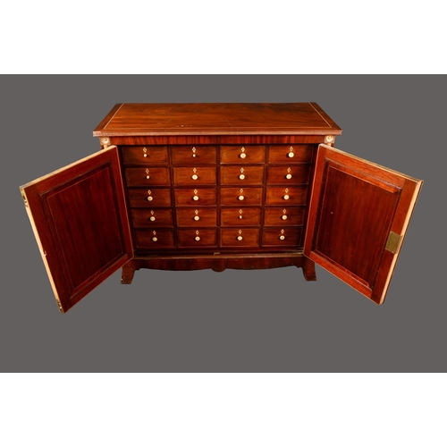 2073 - A 19th century mahogany and parcel-gilt collector's cabinet, moulded rectangular top above a pair of... 