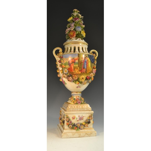 233 - A 19th century German porcelain urnular pedestal vase and cover, painted with Deutsche Blumen and ap... 