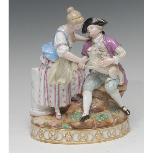 239 - A Meissen  figure group, of a gallant and companion, he seated, with a lamb on his knee, oval base w... 