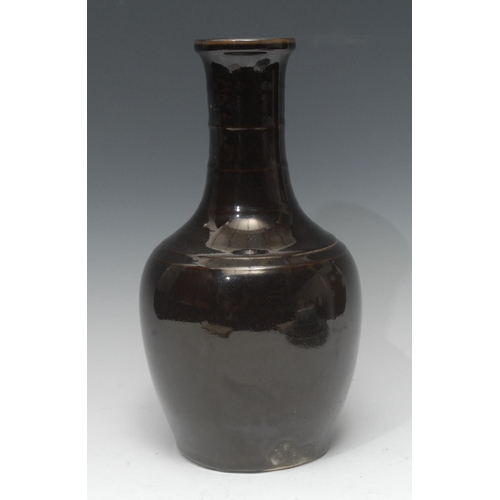 283 - A 19th century Chinese black monochrome vase, ribbed neck, 32cm high