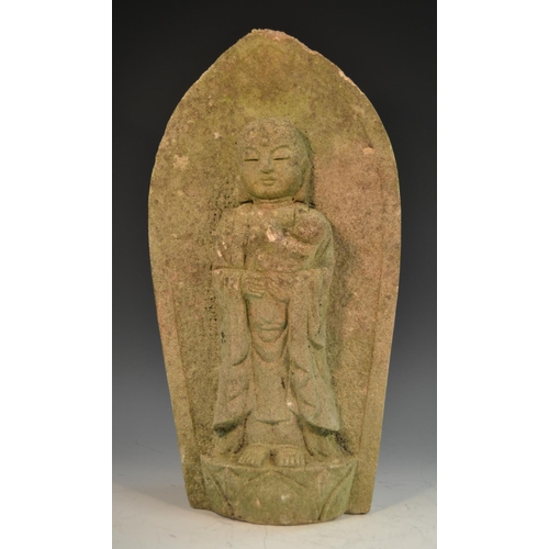 347 - A Chinese limestone shrine figure, carved as Buddha cradling an infant, within a lotus, 46cm high, 1... 