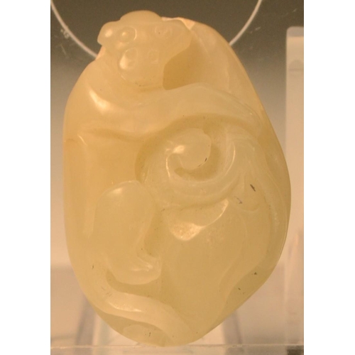 352 - A jade carving, of a monkey, 5cm high