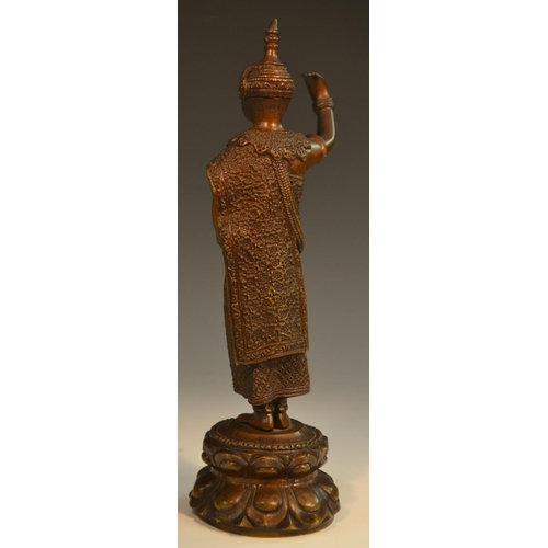 367 - Siamese School (19th/early 20th century), a brown patinated bronze, of a deity, standing upon a lotu... 