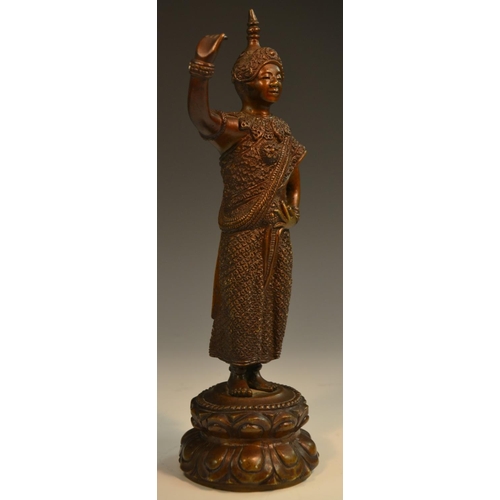 367 - Siamese School (19th/early 20th century), a brown patinated bronze, of a deity, standing upon a lotu... 