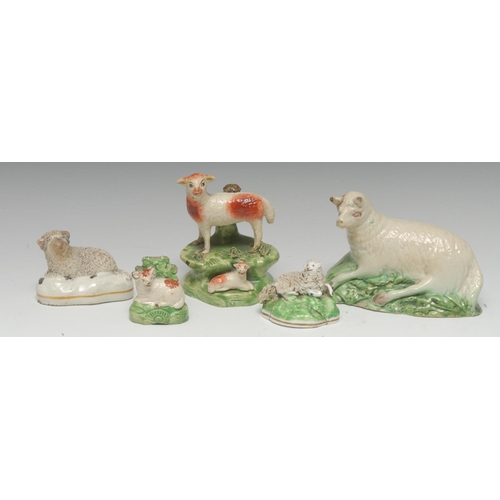 40 - An 18th century Staffordshire creamware recumbent sheep, leaf moulded green base, 14.5cm wide, c.179... 