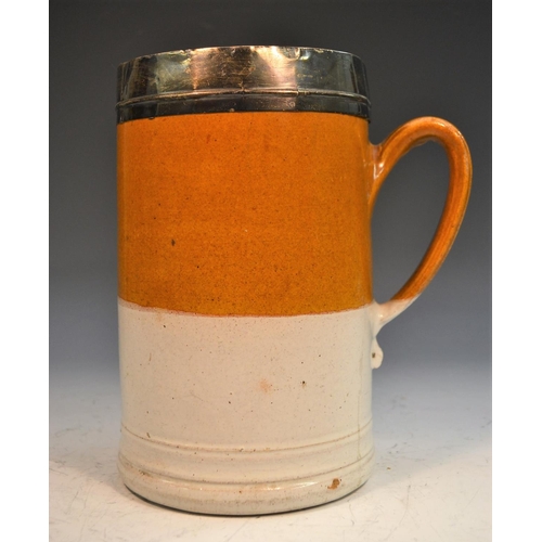 43 - An early 18th century silver-mounted London stoneware quart mug, quite plain, the collar rim monogra... 