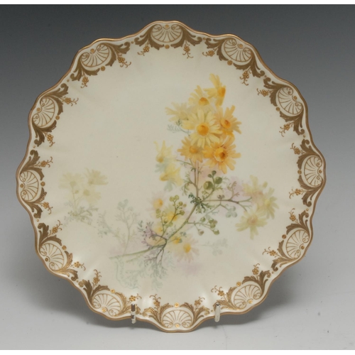 48 - A Doulton Burslem wavy edge plate, painted by David Dewsberry, signed with yellow wild flowers, the ... 