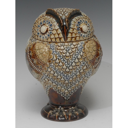 51 - A Doulton Lambeth stoneware  owl tobacco jar and cover, detachable head, in relief with stylised pol... 