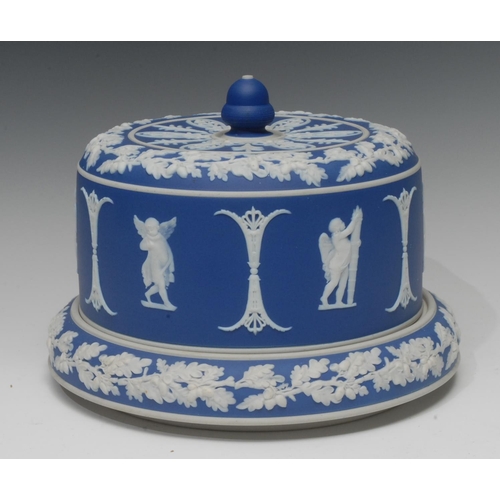55 - A Wedgwood type blue jasper stilton dome, typically sprigged in white with classical figures, fruiti... 