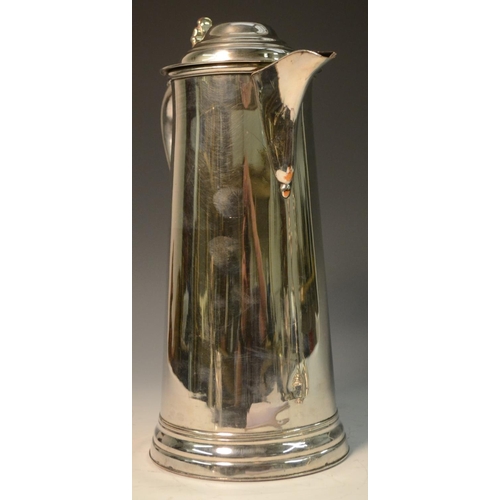 577 - A George III Old Sheffield Plate spreading cylindrical flagon, hinged domed cover with shaped thumbp... 