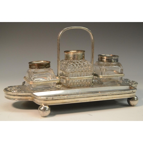 578 - A George III Old Sheffield Plate three-bottle inkstand, gadrooned borders, arched carrying handle, t... 