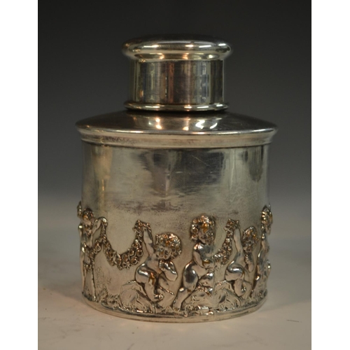 586 - A Regency Old Sheffield Plate cylindrical tea caddy, push-fitting cover, the side embossed with a pr... 