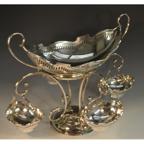 593 - An E.P.N.S table centre epergne, the central boat shaped bowl with pierced border, above four smalle... 