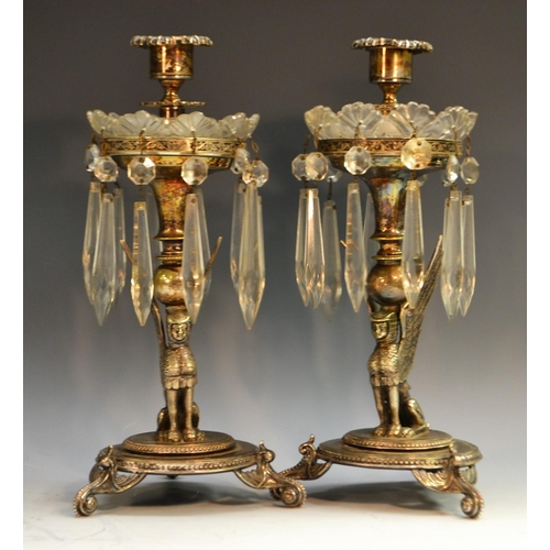 597 - A pair of Victorian E.P.N.S and cut glass candle lustres, each campana sconce above a shaped drip pa... 