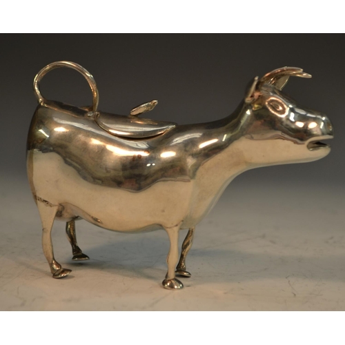 654 - A 19th century Continental silver cow creamer, in the manner of John Schuppe, 13cm long, import mark... 