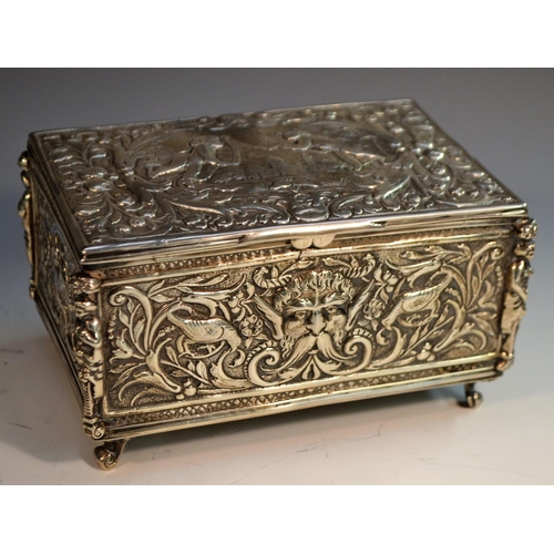 655 - A 19th century Continental silver rectangular table box, hinged cover cast with scantily clad putti ... 