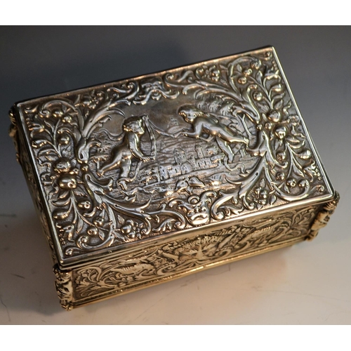 655 - A 19th century Continental silver rectangular table box, hinged cover cast with scantily clad putti ... 