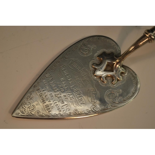 657 - A 19th century Indian silver presentation trowel, the pointed heart-shaped blade inscribed Foundatio... 