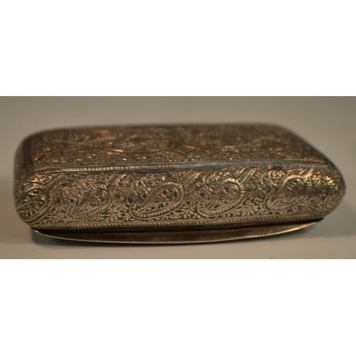 659 - A 19th century Persian silver snuff box, chased overall in the Islamic taste with dense foliage, hin... 