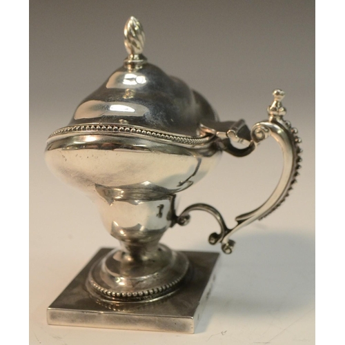 682 - A George III provincial silver oval pedestal mustard, hinged cover with spiral knop finial, beaded b... 