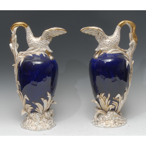 71 - A pair of early 19th century English porcelain ewers, possibly H. & R. Daniel, and of Sèvres vase cy... 