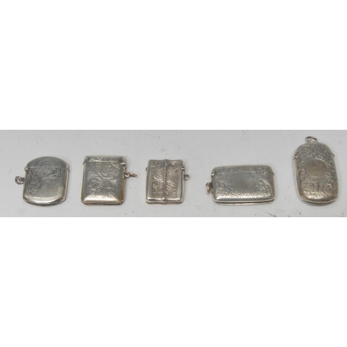 746 - A late Victorian silver rounded rectangular vesta case, chased with leafy C-scrolls, hinged cover su... 