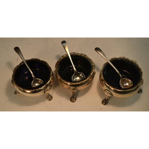 749 - A matched set of three early George III silver cauldron salts, hoof feet, 6cm diam, various dates an... 