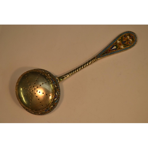 780 - A Russian silver and cloisonne enamel sifter spoon, decorated in polychrome, gilt oval bowl, 15.5cm ... 