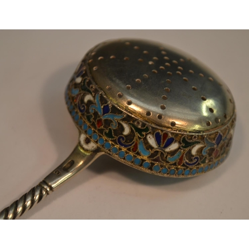 780 - A Russian silver and cloisonne enamel sifter spoon, decorated in polychrome, gilt oval bowl, 15.5cm ... 