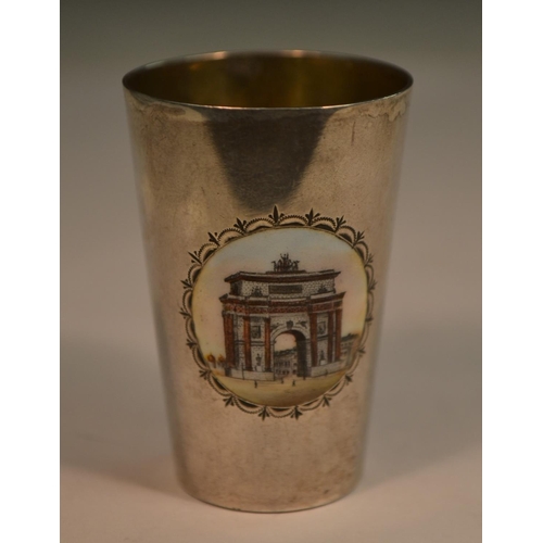 781 - A Russian silver and enamel tapered cylindrical vodka cup , decorated in polychrome with The Triumph... 