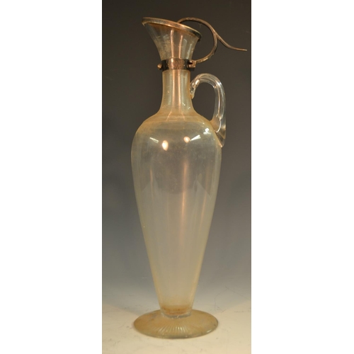 799 - A Victorian Aesthetic Movement silver-mounted clear glass slender ovoid claret jug, the neck and sho... 