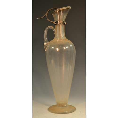 799 - A Victorian Aesthetic Movement silver-mounted clear glass slender ovoid claret jug, the neck and sho... 