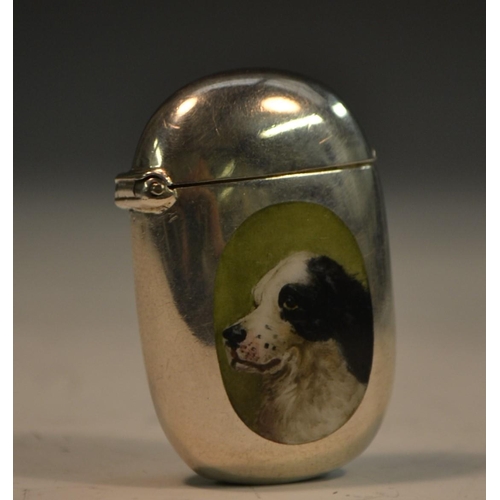 807 - A Victorian silver and enamel rounded rectangular novelty vesta case, decorated with a spaniel dog, ... 