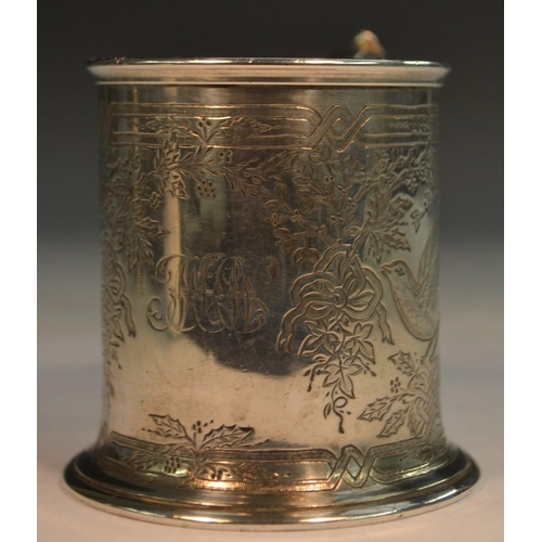 810 - A Victorian silver cylindrical child's mug, well engraved with birds amongst ribbon-tied foliage, ac... 