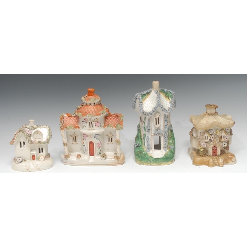 9 - A 19th century Staffordshire cottage, applied with shredded clay, 24cn high, c.1880;  others (4)