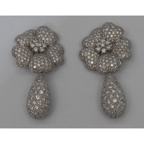 1005 - A pair of metamorphic pave set diamond floral cluster droplet earrings, principle five petal floral ... 