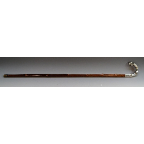 1212 - A German gentleman's silver and bamboo walking stick, the naturalistic crook-shaped handle as sprout... 