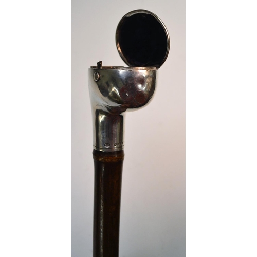 1217 - A Victorian gentleman-smoker's novelty silver and bamboo system walking stick, retailed by Brigg of ... 