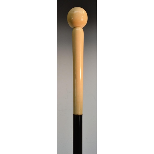 1219 - A 19th century novelty gentleman's ivory and two-tone hardwood walking 'pill' system cane, the spher... 