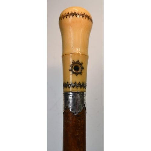 1224 - A Queen Anne silver piqué, ivory and malacca gentleman's walking stick, the bulbous handle typically... 