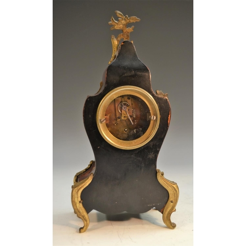 1469 - A French tortoiseshell and gilt metal cartouche shaped mantel clock, the white enamelled dial with R... 