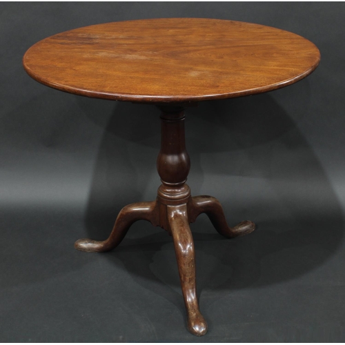 2048 - A George III mahogany tripod supper table, circular one piece top tilting on a birdcage, cabriole le... 