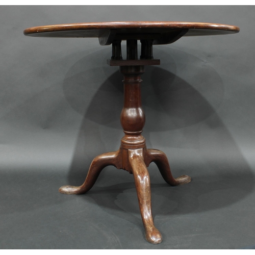 2048 - A George III mahogany tripod supper table, circular one piece top tilting on a birdcage, cabriole le... 