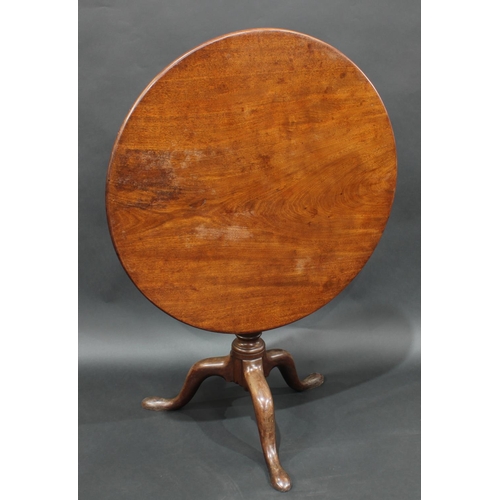 2048 - A George III mahogany tripod supper table, circular one piece top tilting on a birdcage, cabriole le... 