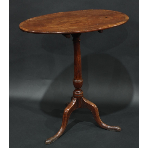 2050 - A 'George III' mahogany and oak tripod ocassional table, the associated crossbanded top outlined wit... 